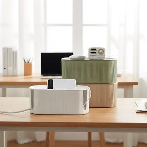 May include: A set of three ceramic mugs with a speckled, matte finish. The mugs are in shades of cream, light gray, and dark gray. Each mug has a simple, minimalist design, perfect for coffee or tea.