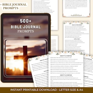 May include: A digital tablet displays "500+ Bible Journal Prompts" with a cross image. Several pages with floral accents and prompts are scattered around. The text "Instant Printable Download - Letter Size & A4" is at the bottom.