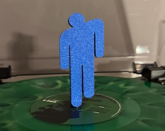Statuetta in vinile da posizionare sopra il disco