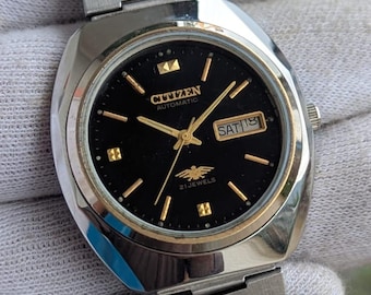 Montre automatique vintage Citizen Eagle 7 21 rubis cadran noir, jour/date,
