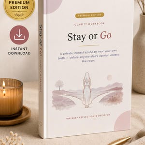 May include: A white workbook titled Stay or Go Clarity Workbook with a soft pink and beige watercolor illustration of a person standing at a fork in a path. The cover features the text A private, honest space to hear your own truth.