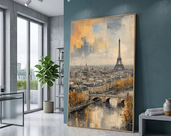 May include: A framed canvas print of Paris, France, featuring the Eiffel Tower, bridges, and buildings along a river. The artwork has a muted color palette with shades of gray, beige, and orange, creating a vintage aesthetic. The print is displayed in a modern interior setting.