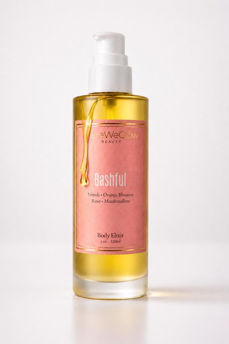 Bashful luxury perfume oil bottle on clean white background, showcasing pump dispenser ultra concentrated floral gourmand body oil with long lasting fragrance, moisturizing glow oil and feminine soft girl aesthetic.