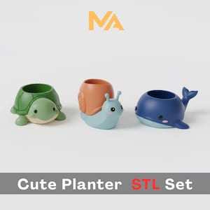 May include: A set of three animal-shaped planters: a green turtle, a blue snail with an orange shell, and a blue whale. Each planter has an open top for plants. The text "Cute Planter STL Set" is at the bottom.