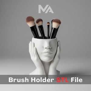May include: A white ceramic brush holder in the shape of a face, holding makeup brushes. The brushes have black handles and brown bristles. The text "Brush Holder STL File" is at the bottom.