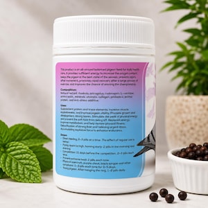 May include: White plastic bottle of pigeon feed with a purple and pink label. The label includes text about the product's benefits and ingredients. The bottle is next to a small white bowl of dark brown pellets and green leaves.