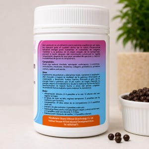 May include: A white cylindrical bottle with a pink and purple label, containing small, dark brown pellets. The label includes text in Spanish, detailing the product's composition and uses. A small white bowl with pellets is in the background.