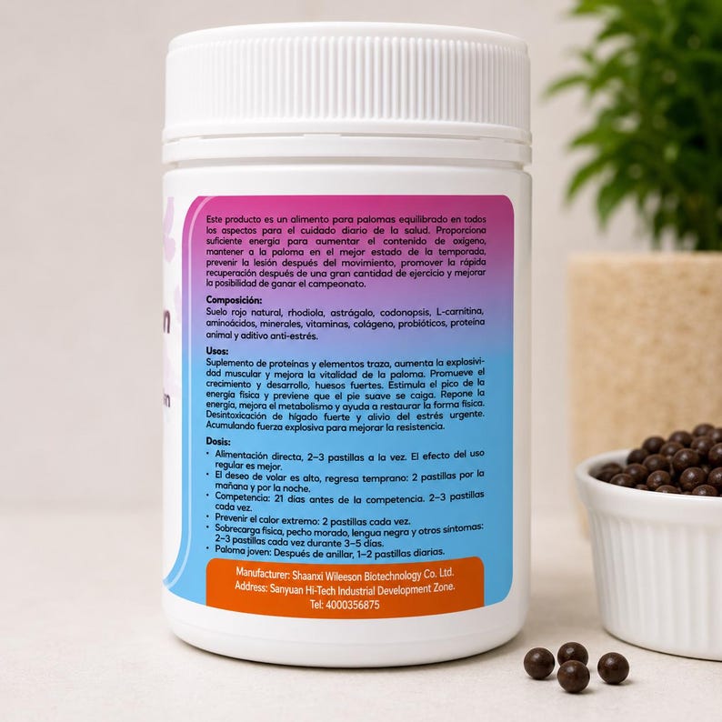 May include: A white cylindrical bottle with a pink and purple label, containing small, dark brown pellets. The label includes text in Spanish, detailing the product's composition and uses. A small white bowl with pellets is in the background.