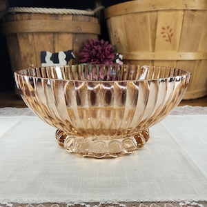 May include: A rustic wooden sign with the text "Welcome to our home" in a handwritten style. The sign features a distressed finish and a simple, inviting design, perfect for a front porch or entryway.