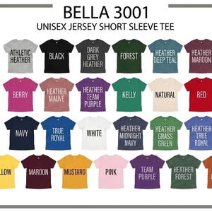 May include: A selection of Bella 3001 unisex short sleeve tees in a variety of colours. The image shows tees in shades like black, red, and navy, with labels such as "Athletic Heather," "Berry," and "True Royal." The image presents a range of short sleeve tee options.