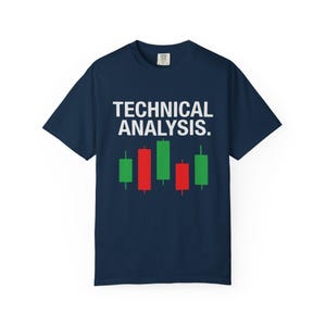 May include: Navy blue t-shirt with the text "TECHNICAL ANALYSIS." in white. Below the text are green and red candlestick chart graphics, representing market trends. The shirt is a classic crew neck style.
