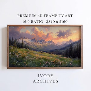 May include: A framed landscape painting of a mountain scene with a vibrant sunset. The artwork features a valley, snow-capped mountains, and a field of wildflowers. The frame is made of wood. Text on the image reads "PREMIUM 4K FRAME TV ART 16:9 RATIO- 3840 x 2160" and "IVORY ARCHIVES".