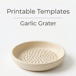 May include: A beige ceramic garlic grater with a textured surface. The grater is round with a shallow bowl shape. The text "Printable Templates" and "Garlic Grater" are above the grater.