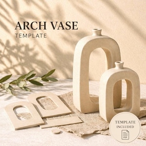 May include: Two beige arch-shaped vases with a template and the text "ARCH VASE TEMPLATE". The vases have a modern, minimalist design. The template includes arch shapes and a small circle. The image is on a neutral background.