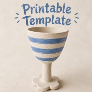 May include: A ceramic goblet with a wide, striped blue and white bowl, a slender stem, and a flower-shaped base. The words "Printable Template" are written in blue above the goblet.