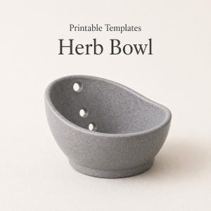 May include: A gray herb bowl with three drainage holes. The bowl has a speckled texture and a rounded shape. The text "Printable Templates" and "Herb Bowl" are printed above the bowl.