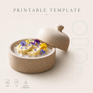 May include: A beige ceramic serving dish with a lid, filled with a creamy substance and decorated with colorful edible flowers. The dish sits on a bed of ice. The words "PRINTABLE TEMPLATE" are at the top of the image.