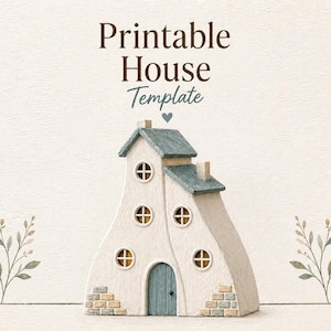Puede incluir: Una plantilla de casa caprichosa, blanquecina, con puerta y tejado azules, con ventanas redondas con interiores amarillos. El texto "Printable House Template" se muestra en la parte superior, con un símbolo de corazón. Ramas decorativas flanquean la casa.