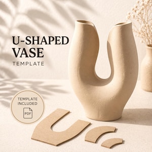 May include: A beige U-shaped vase with a template, featuring the text "U-SHAPED VASE TEMPLATE". The template includes a PDF icon. Additional cut-out pieces are visible, suggesting a DIY project or craft. The vase has a modern, minimalist design.