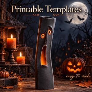 May include: A tall, dark gray, cylindrical sculpture with a carved, wide-open mouth and two circular eyes glowing with orange light. The text 'Printable Templates' appears at the top, and 'easy To mak' is visible near the bottom right.