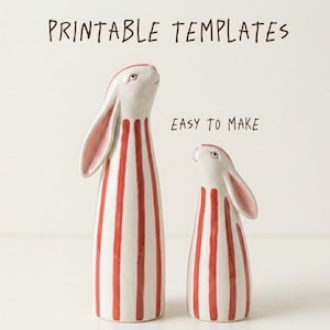 May include: Two ceramic rabbit figurines. The rabbits are white with red vertical stripes and pink inner ears. The text "PRINTABLE TEMPLATES" and "EASY TO MAKE" are above the rabbits.