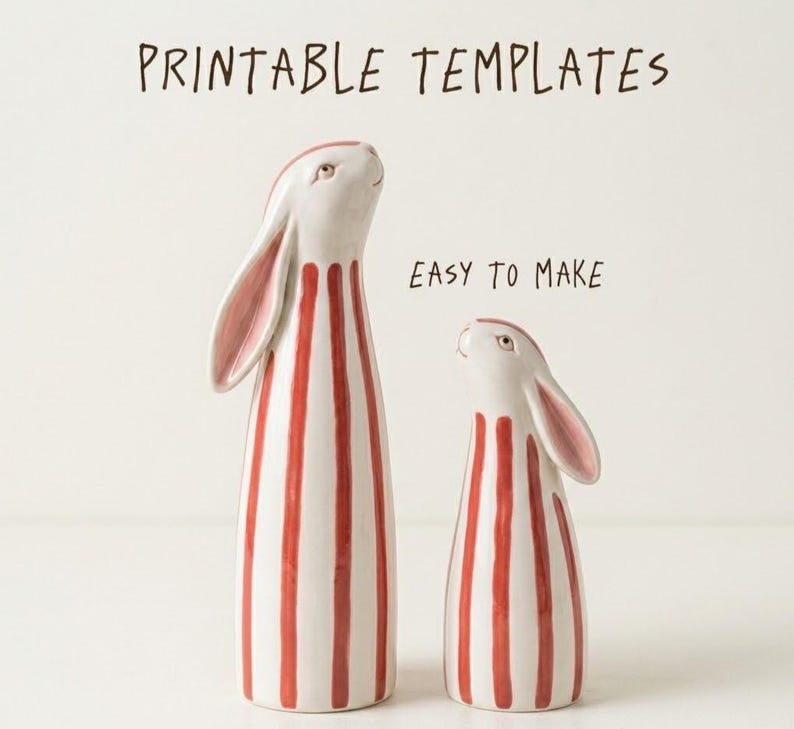 May include: Two ceramic rabbit figurines. The rabbits are white with red vertical stripes and pink inner ears. The text "PRINTABLE TEMPLATES" and "EASY TO MAKE" are above the rabbits.