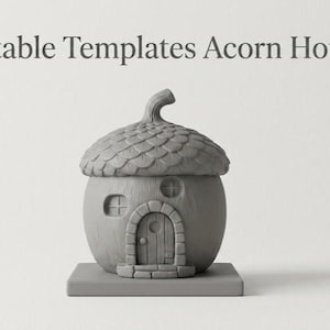 May include: A gray, acorn-shaped house with a textured roof and a small door. The house has two windows and sits on a square base. The text "Printable Templates Acorn House" is at the top.