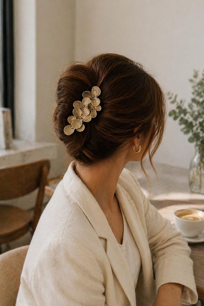 Pince a cheveux fleurs dorees orchidee