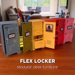 May include: A row of colorful desk organizers shaped like lockers. Each locker is a different color: gray, olive green, yellow, orange, red, and pink. The lockers have doors that open to reveal storage compartments and are labeled with words like "GAMES" and "OFFICE".
