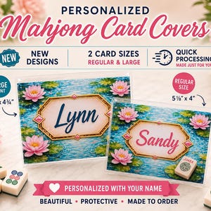 May include: Two personalized Mahjong card covers featuring a pond scene with pink lotus flowers and green lily pads. One cover displays the name Lynn and measures 6 1/8 inches by 4 3/4 inches. The other displays the name Sandy and measures 5 1/8 inches by 4 inches.