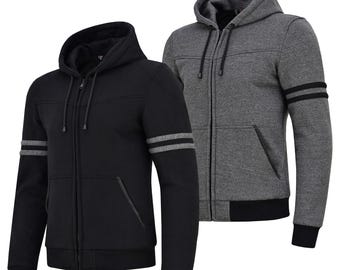 May include: Two hooded zip-up jackets. One is black with gray stripes on the sleeves, the other is gray with black stripes. Both have a front zipper, pockets, and a black bottom hem.