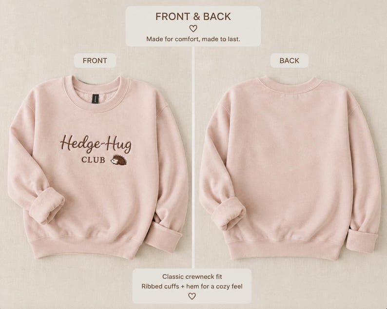 May include: A light pink crewneck sweatshirt featuring the embroidered text Hedge-Hug CLUB with a small hedgehog graphic on the front. The garment has long sleeves with ribbed cuffs and a ribbed hem. The back of the sweatshirt is plain.