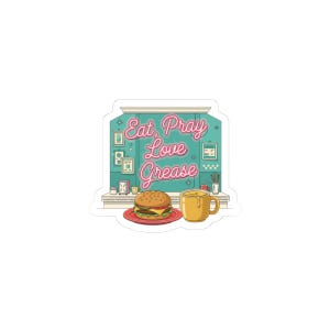 May include: A sticker featuring a diner scene with the text "Eat, Pray, Love, Grease" in pink neon. A burger on a red plate and a yellow mug of coffee are in the foreground. The background is a teal wall with framed pictures.