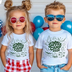 May include: Two children wearing white t-shirts with a green "Summer Camp 2026" graphic. The girl wears red and white checkered shorts and round red sunglasses. The boy wears blue jeans and blue sunglasses. Balloons are in the background.