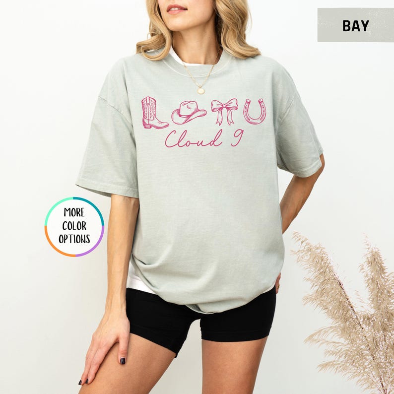 May include: A set of three ceramic mugs with a speckled, matte finish. The mugs are in shades of cream, light gray, and dark gray. Each mug has a simple, minimalist design and a rounded handle.