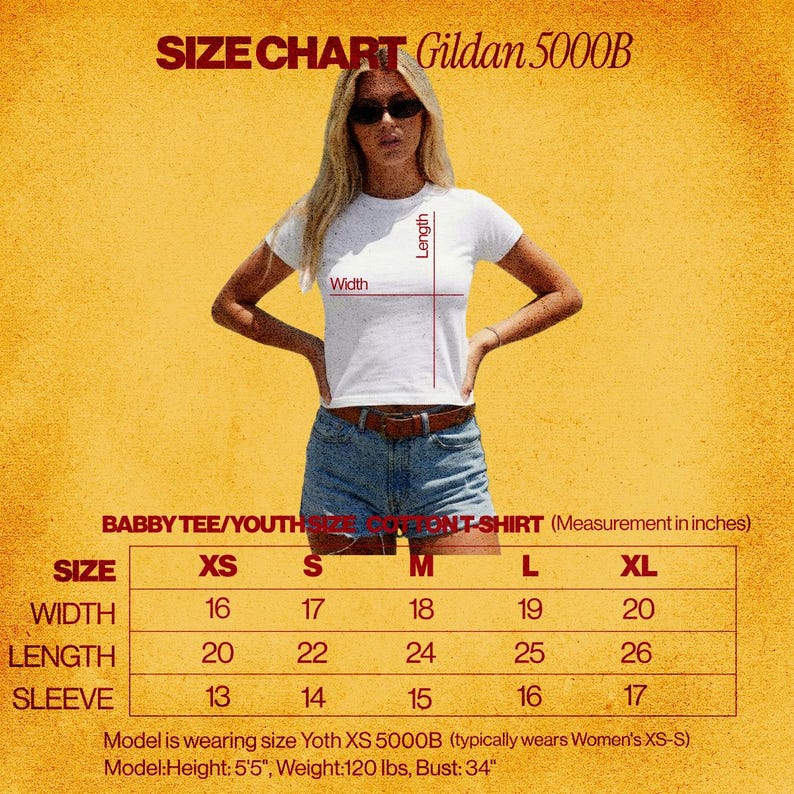May include: A white t-shirt size chart for the Gildan 5000B model. The graphic displays a white t-shirt with red lines indicating width and length measurements. A table lists sizes XS through XL with corresponding width, length, and sleeve measurements in inches.