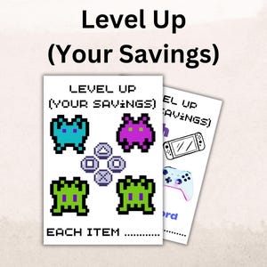 May include: Two white sheets of paper with the text "Level Up (Your Savings)". One sheet features pixelated alien graphics and the words "Each Item". The other sheet has a drawing of a game console and controller.