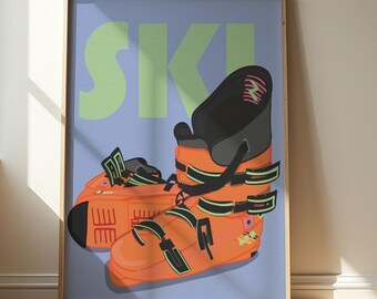 May include: Orange and black ski boots with neon green accents are featured in a framed print. The word "SKI" is displayed in large, neon green letters against a light blue background. The boots have multiple buckles.