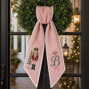 Personalized Christmas Wreath Sash, Red Stripe Nutcracker Embroidered Door Bow, Custom Monogram Holiday Decor, Festive Front Door Home Gift