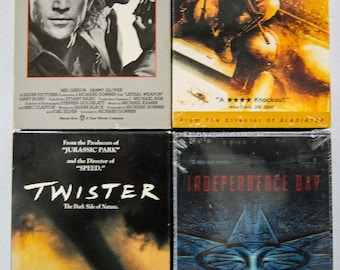 Lot of 4 VHS Tapes Independence Day Twister Black Hawk Down Lethal Weapon 90s