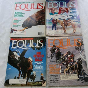 May include: Four vintage issues of the magazine "EQUUS" are displayed. The covers feature images of horses, riders, and equestrian activities. The magazine titles and cover stories are visible, with a focus on horse care and training.