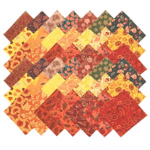 May include: A collection of square fabric swatches arranged in a grid, featuring various autumn-themed patterns including sunflowers, acorns, maple leaves, and ferns in a warm colour palette of orange, yellow, red, brown, and dark green.