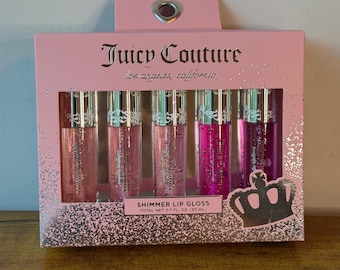 Nuevo paquete de 5 brillos labiales con brillo hidratante de Juicy Couture con aroma a fresa.