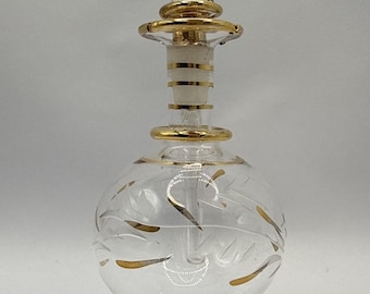 Frasco de perfume vintage de vidrio transparente con tapón con detalles dorados y grabado floral, 7 pulgadas.