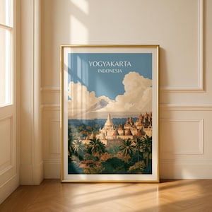 Może przedstawiać: Oprawiony pionowy wydruk artystyczny przedstawiający ilustrację krajobrazu Yogyakarty w Indonezji. Scena ukazuje kompleks świątynny otoczony palmami i bujną zielenią, z górą w oddali pod błękitnym niebem z białymi chmurami.
