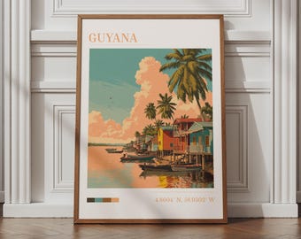 May include: A framed art print featuring a colorful illustration of a coastal scene in Guyana. The artwork depicts vibrant houses, palm trees, and boats on the water, with the word "GUYANA" at the top. Coordinates are listed at the bottom.