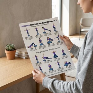 May include: A poster with the text "BOSU BALL EXERCISES FOR CORE AND BALANCE" and illustrations of exercises. The poster is held by a person. The exercises are designed to strengthen core and improve stability.