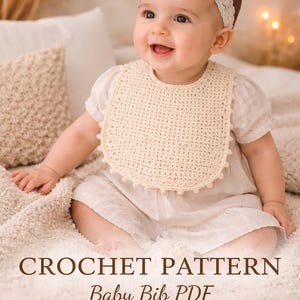 May include: A baby wearing a cream-coloured crocheted bib and a matching lace headband smiles at the camera. The image includes text that reads "CROCHET PATTERN Baby Bib PDF Instant Download."