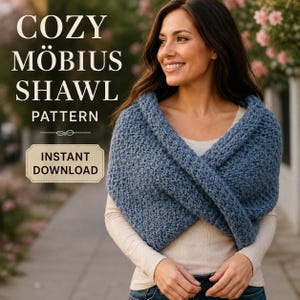 May include: A blue chunky knit Möbius shawl with a textured stitch pattern. The image includes the text COZY MÖBIUS SHAWL PATTERN and INSTANT DOWNLOAD. The shawl is worn over a long-sleeved cream shirt, featuring a twisted loop design.
