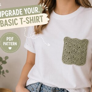 May include: A white t-shirt featuring a sage green crocheted pocket with a scalloped shell stitch pattern. Text on the image reads UPGRADE YOUR BASIC T-SHIRT and PDF PATTERN with a small heart icon and a dashed line pointing to the pocket.